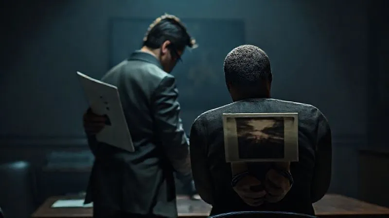 Photorealistic, professional photography, 8K, cinematic lighting, sharp focus, depth of field, shot on a high-end DSLR. A detective in a dimly lit room, leaning casually against a table, his back to a handcuffed suspect, holding up a file with a single, blurry photograph, seemingly talking to himself but loud enough for the suspect to hear. The suspect's face is obscured but shows signs of contemplation or distress.