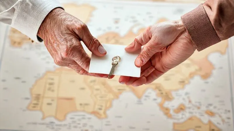 A photorealistic image of two hands, one older and one younger, gently passing a legal document or a symbolic key across a blurred state border on a map. The focus is on the exchange, symbolizing the smooth transfer of guardianship. Professional photography, 8K, cinematic lighting, sharp focus, depth of field.